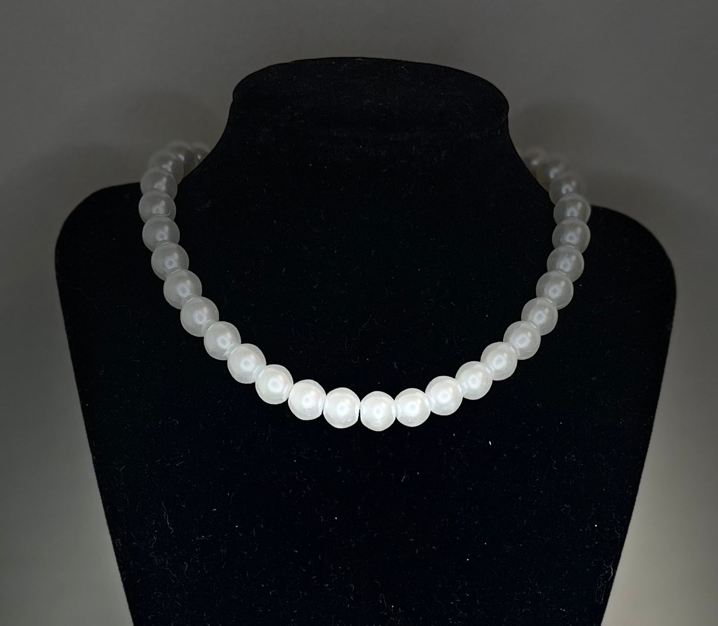 Pärlhalsband med rosett